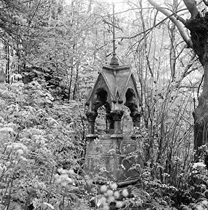 Squat: A square based tomb with squat columns