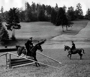 Pastime: SS men practising show jumping