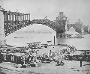 Begun: The St. Louis bridge. The erection - the ribs completed and