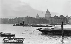 Conveys: St. Paul's Cathedral from the River Thames