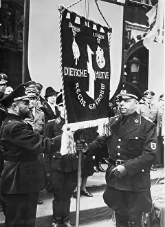 Spurs: Staf de Clercq at a rally in Brussels, 1942