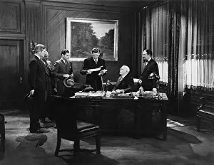 Conferring: Staff meeting in the office