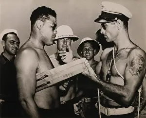 Chested: Staff Sergeant Joe Louis, world champion ?