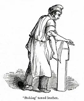 Softening: Staking tawed leather at a leather factory, south London