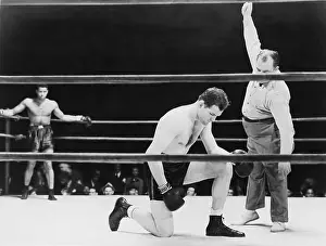 Bouts: Standing on count of eight at a boxing match