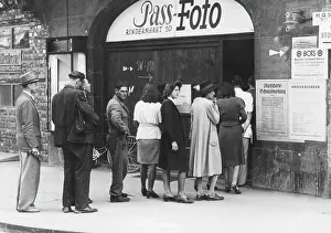Passport: Standing in line for new photos, 1945