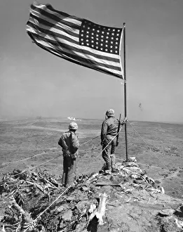 Offensives: Stars and Stripes wave over the summit of Mt