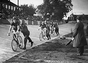 Helpers: Start of a track cycling race, 1931
