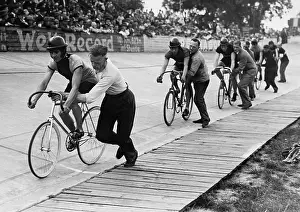 Helpers: Start of a track cycling race, 1931