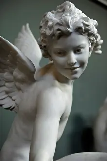 Crouching: Statue of Eros by Laurent-Honor?@ Marqueste