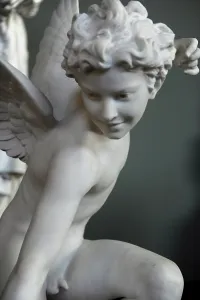 Crouching: Statue of Eros by Laurent-Honor?@ Marqueste
