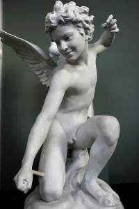 Kneel: Statue of Eros by Laurent-Honor?@ Marqueste