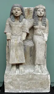 Barefooted: Statue of an official and his wife. Egypt