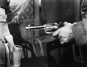 Harmful: Stealing a handgun from the holster of another person