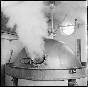 Emitted: Steam being emitted from a copper boiling kettle