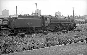 73043: Steam engine over ashpit at Nine Elms Loco Yard