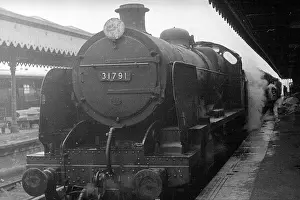 Mogul: Steam engine at a station on the Redhill Reading line