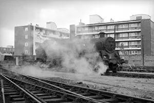 Elms: Steam engine in steam at Nine Elms