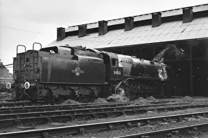 Elms: Steam engine in steam outside Nine Elms New Shed