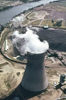 Generates: Steam rises from one of the massive cooling ?