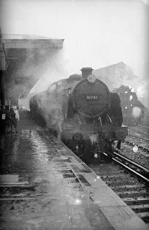 Mogul: Steam train at platform on Reading Redhill line