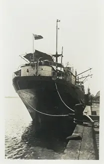 Sepia Images: Steamship moored in a dock