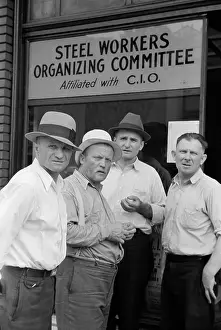Storefront: Steelworkers at a Union storefront. The ?