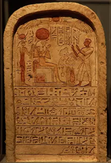 Deities: Stele depicting a priest making an offering to the god Ra. E