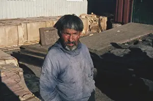 Greenlandic: A Stern, Old Inuit man