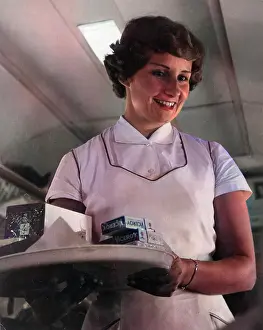 Barnaby (colourised): STEWARDESS/CIGS 1960