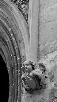 Cherubic: Stone carving on a building, Oxford