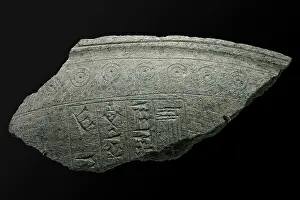 Mounds: Stone fragment with cuneiform inscription, Bahrain