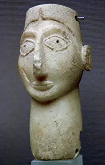 3000: Stone Head. Represent a god, goddess or a worshipper. Late U