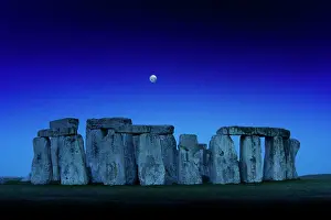 Stone Age: Stonehenge at dusk with moon