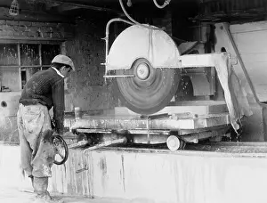 Stonemason: STONEMASON CUTTING STONE