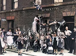 Battersea: Street celebration with flags, VE Day