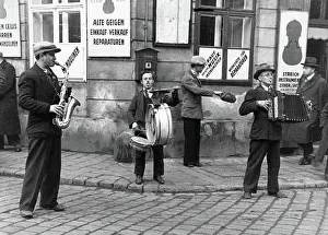 Accordions: Three street musicians