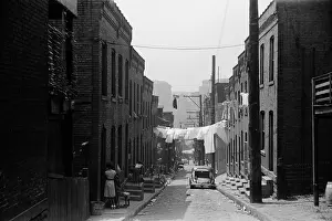 Poorer: Street in Pittsburgh's Hill district. ?