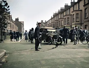 Gutter: Street scene with damaged car