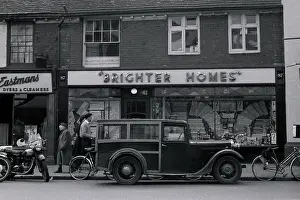 Brighter: Street scene with decorating store, Brighter Homes