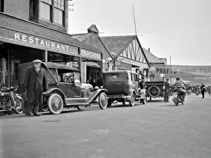 Healey: Street scene outside Pratt's garage