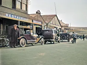 Healey: Street scene outside Pratt's garage
