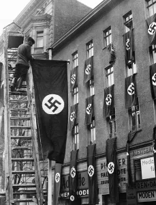 Swastikas: Street with swastika flags in Berlin, 1938