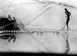 Wearer: STRING OF PEARLS