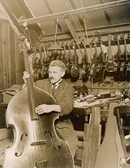 Violas: Stringed instrument maker in his workshop
