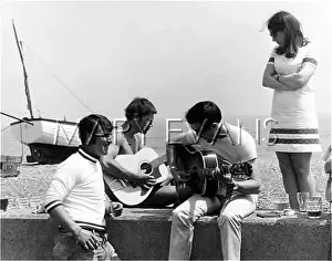 Strumming: STRUMMING BY THE SEA
