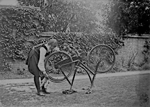 Bpeosa: Student cleaning bicycle