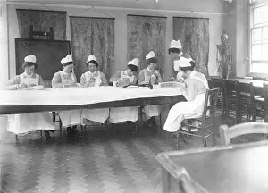 Preliminary: Student nurses working with bandages