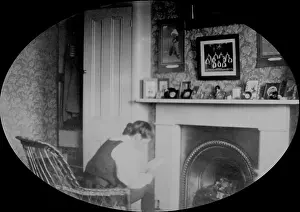 Bpeosa: Student reading in study by a fire