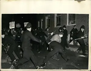 Grappled: Students demonstrate outside Daily Worker offices, London